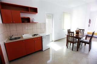 Апартаменты Apartments Baron Свети-Стефан Семейный полулюкс-5